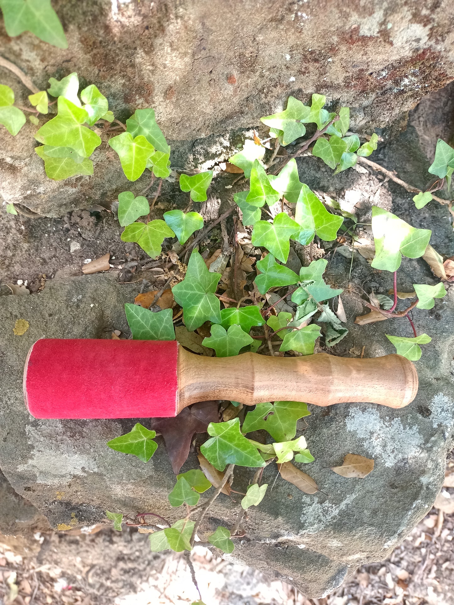 Wooden and red leather stick 19cm diameter 4cm